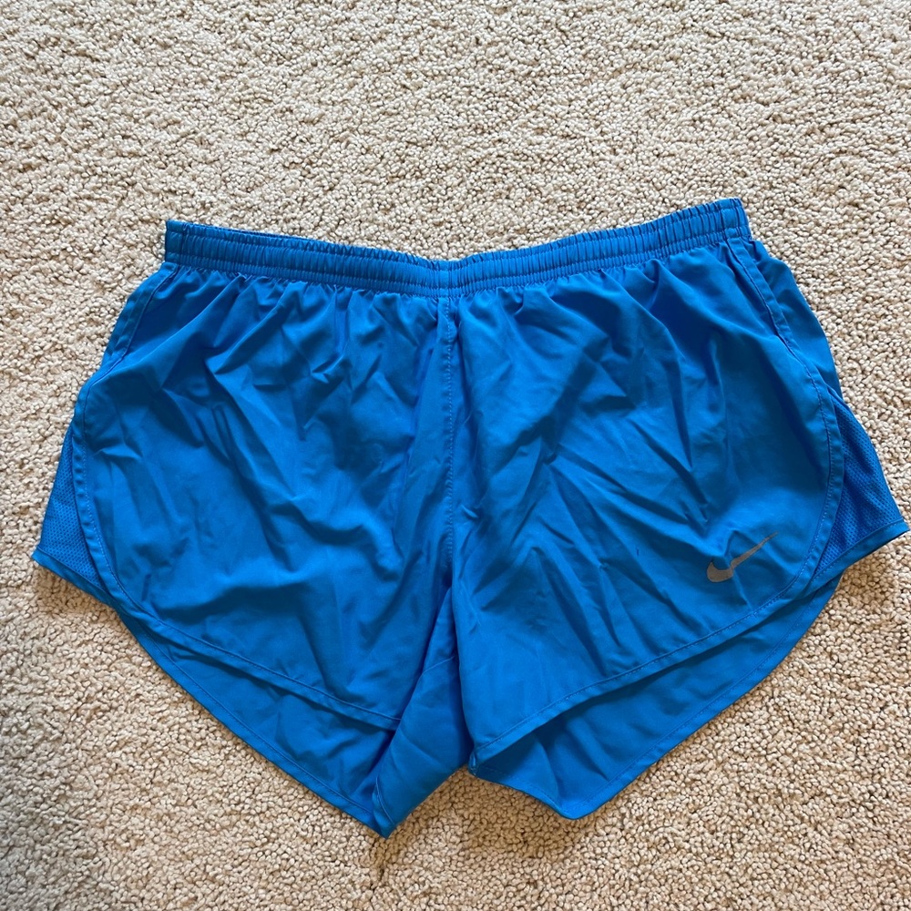 Blue Nike athletic shorts